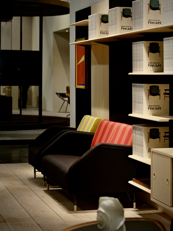 The 77 Sofa (two seater) in oak (clear oil), upholstered with ‘Vidar’ textile in the colour ‘1880’. The loose back cushions are upholstered with ‘Reflex’ in the colour ’0589’.