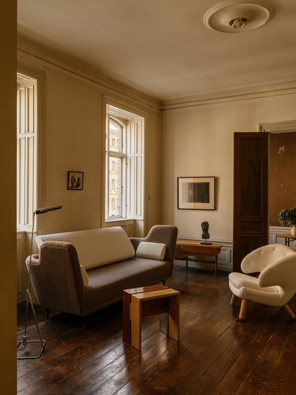 The 57 Sofa with 'Nara' upholstery in the colour '004' on the body and the colour '006' on the back and cushions.