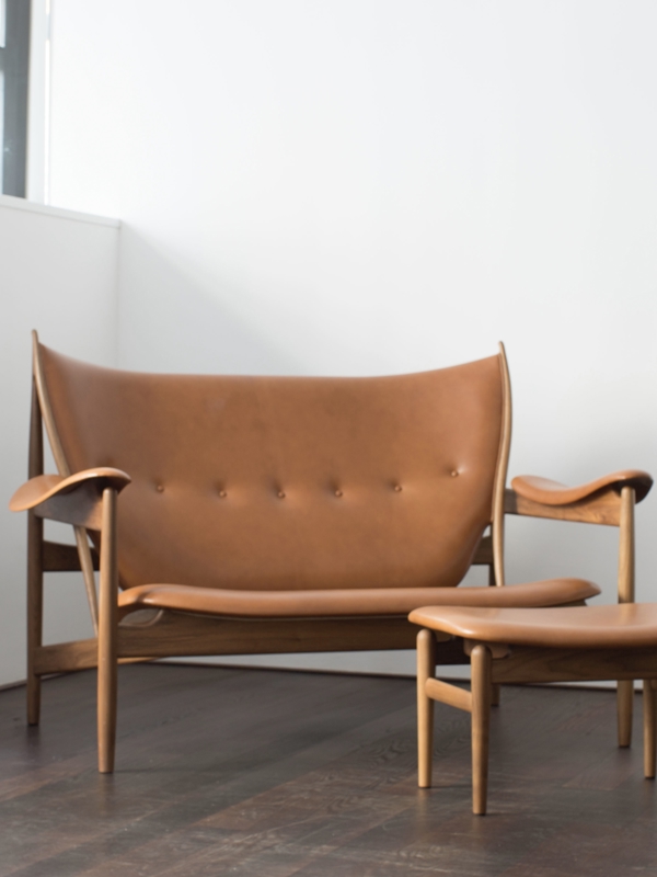 The Chieftain Sofa in walnut with 'Vegetal' upholstery in the colour '95'.