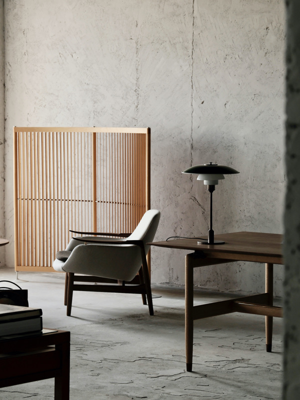 The 53 Chair in walnut with Blans upholstery in the colour 01-100 with a cushion in the colour 01-161.