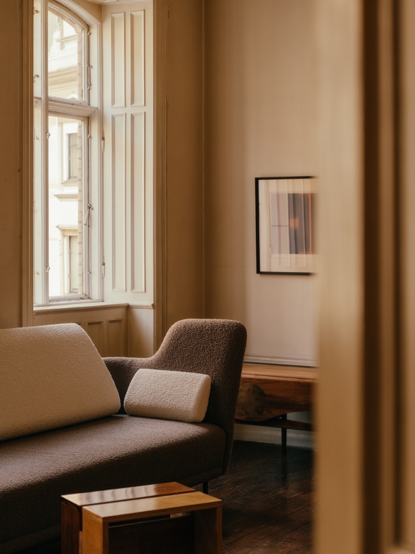 The 57 Sofa with 'Nara' upholstery in the colour '004' on the body and the colour '006' on the back and cushions.