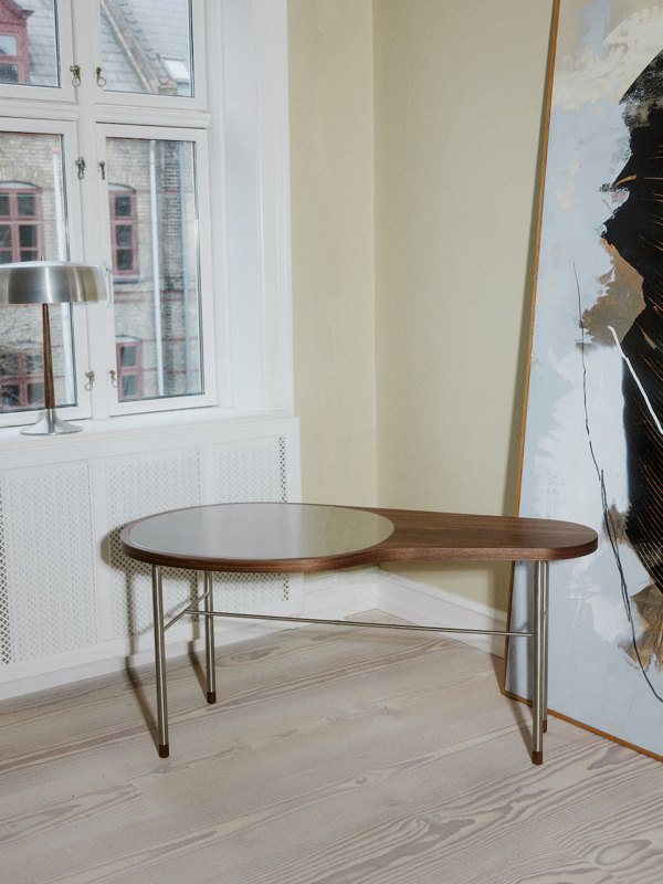 The Ross Coffee Table without vase in stainless steel and walnut.