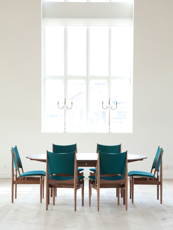 The Silver Table in walnut paired with the Egyptian Chair.